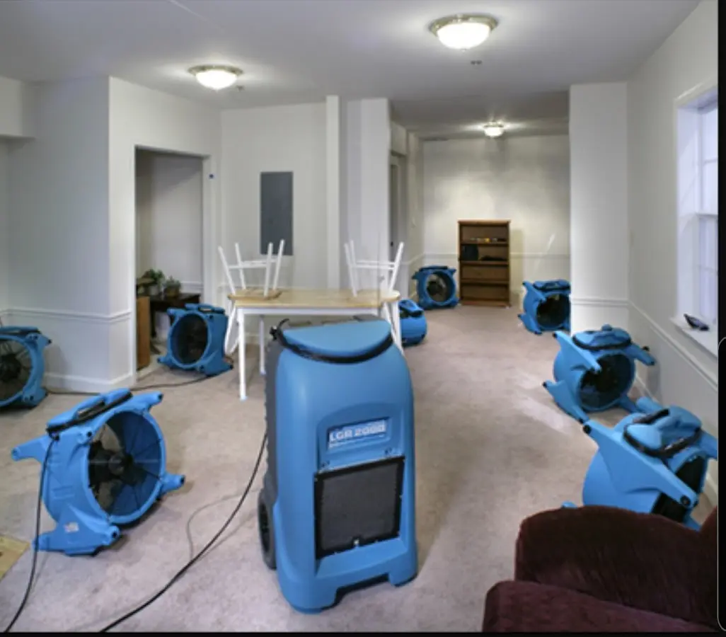 Air movers and dehumidifier setup for Water Damage Restoration in Kirkwood